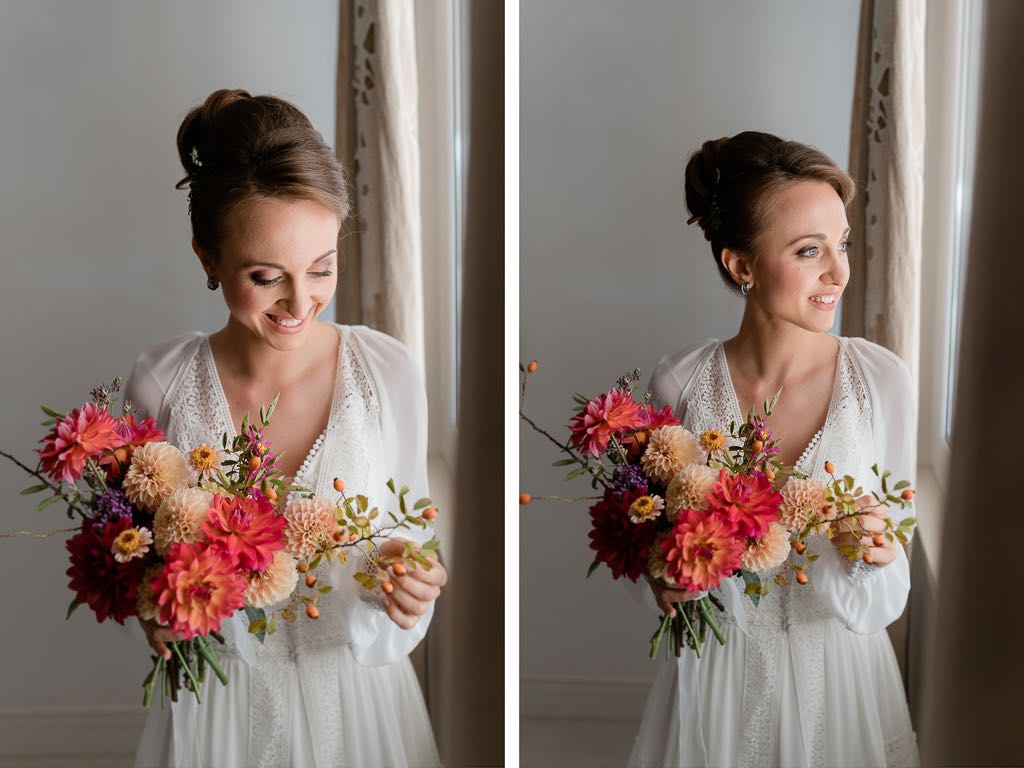 la sposa con il suo bouquet guarda fuori la finestra