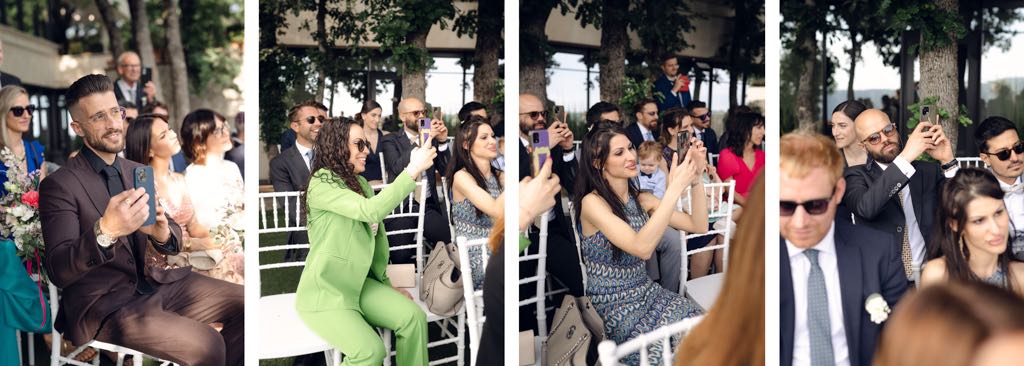 gli ospiti scattano con i telefoni il matrimonio